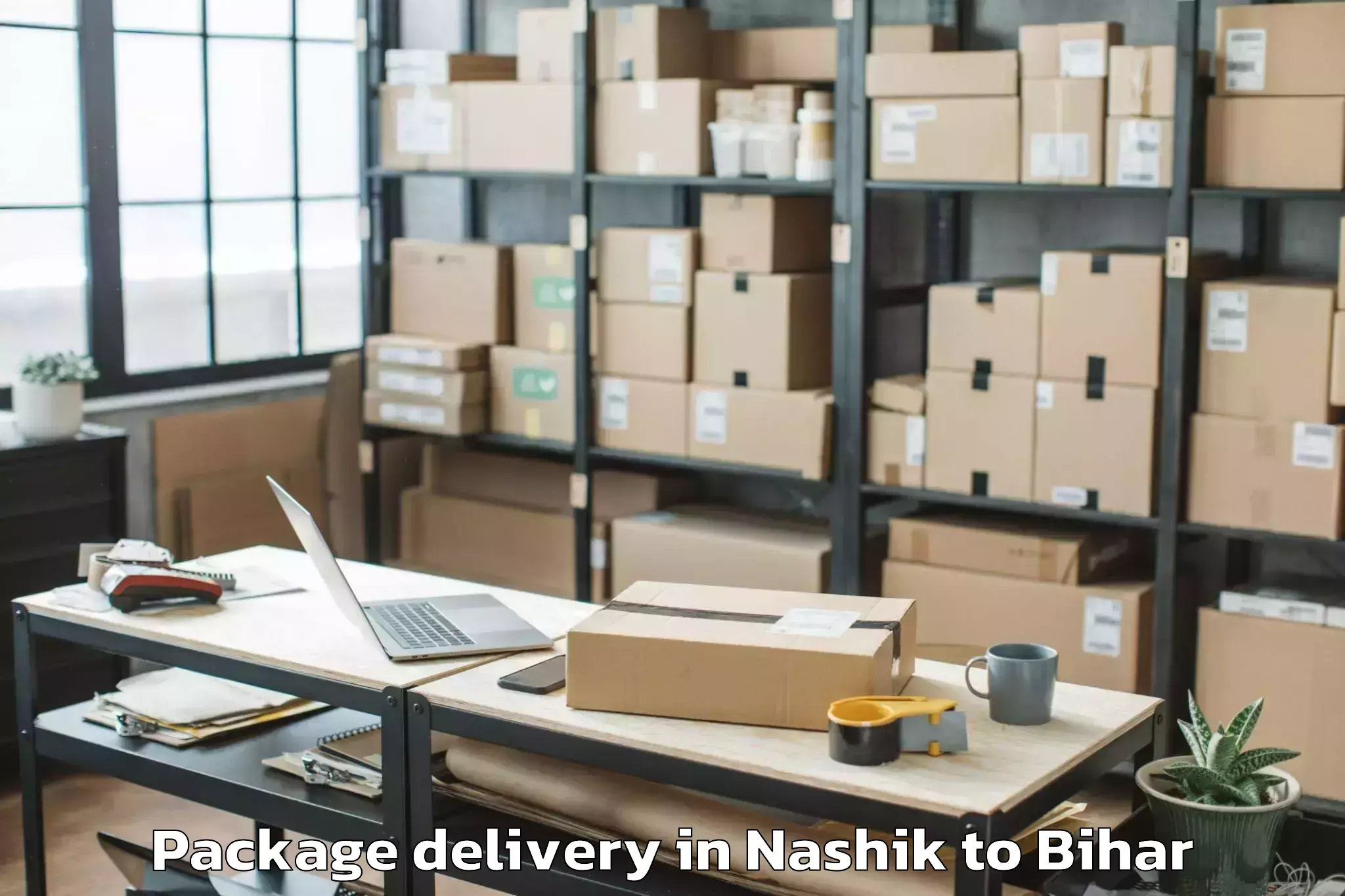 Book Nashik to Barauli Package Delivery